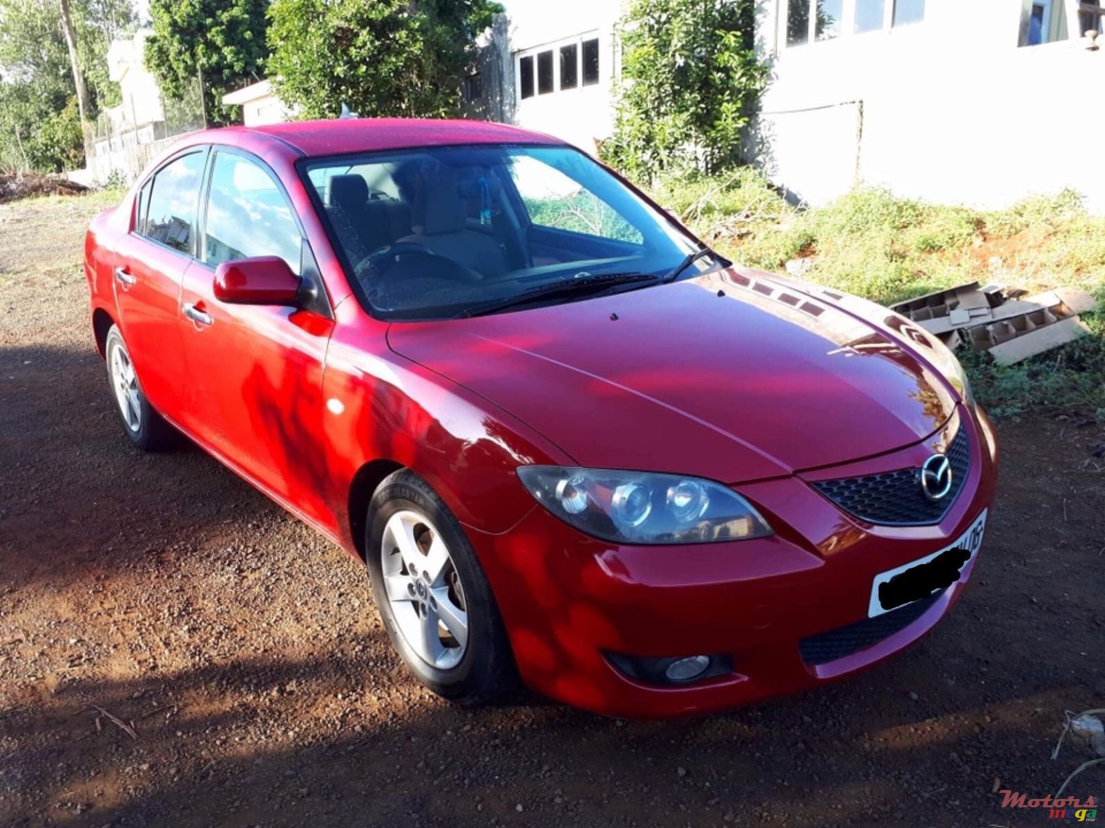 2006' Mazda 3 photo #1