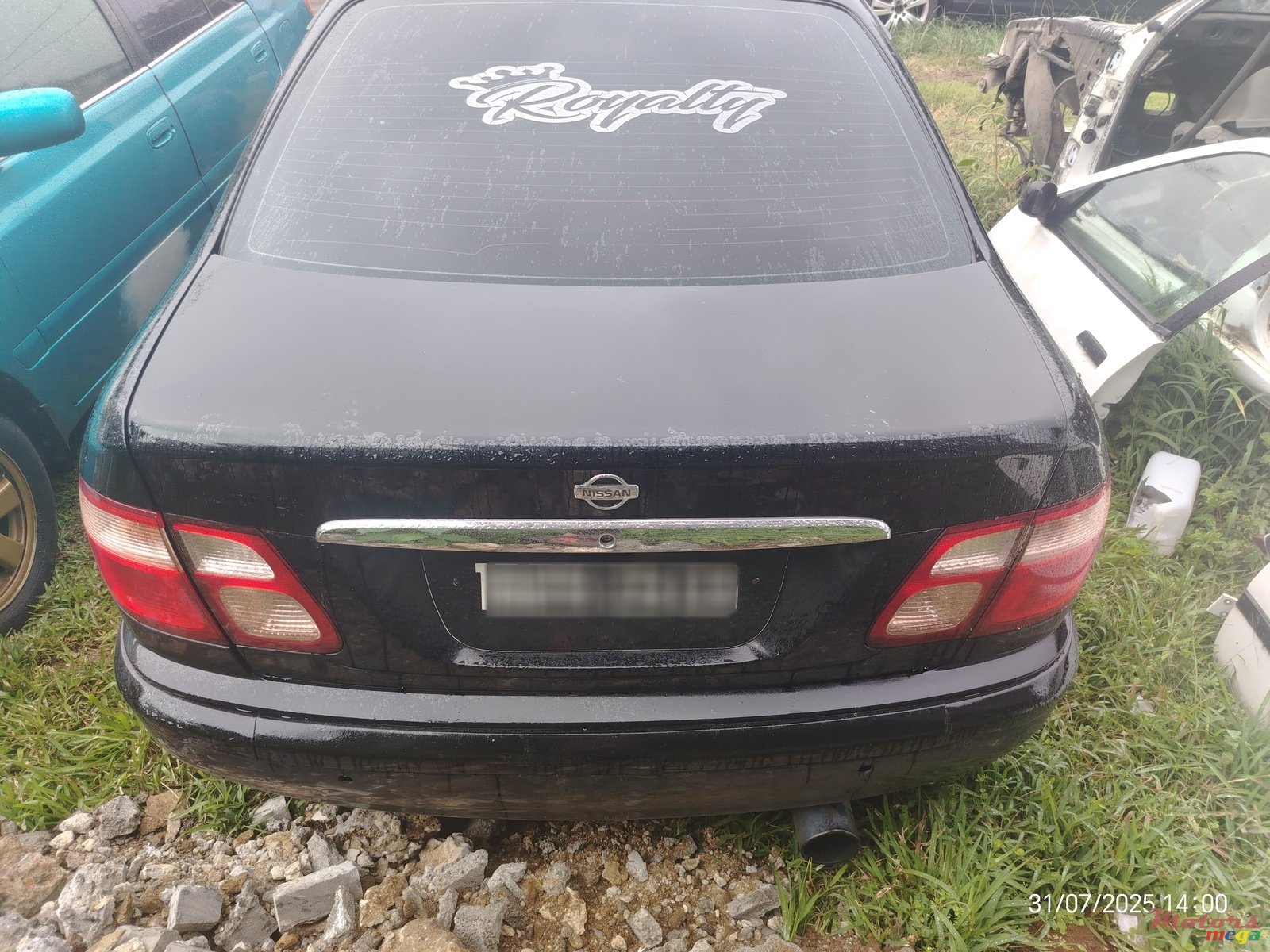 2003' Nissan Sunny photo #1