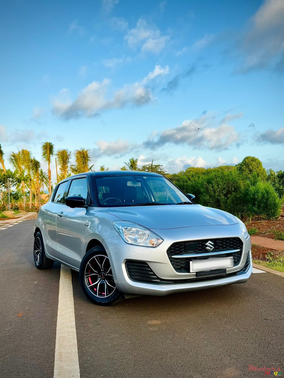 2021' Suzuki Swift Hybrid photo #1