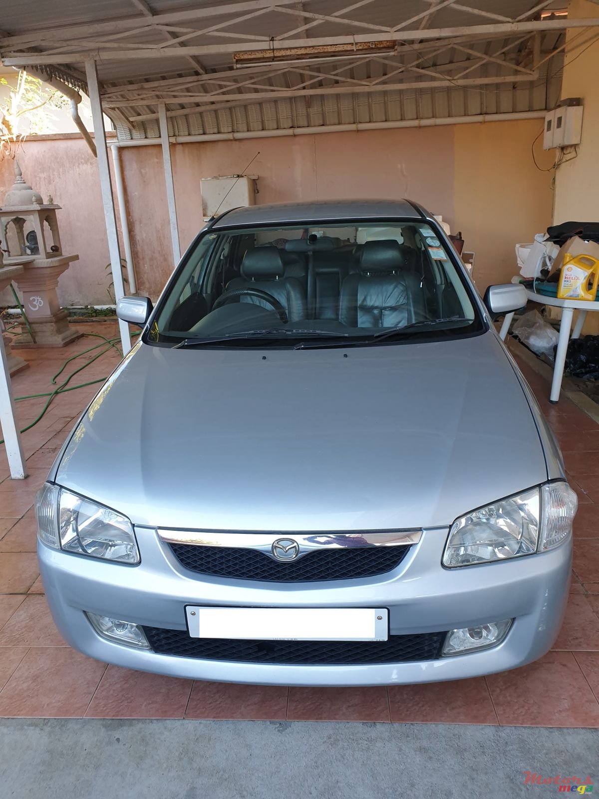 1999' Mazda 323 photo #1