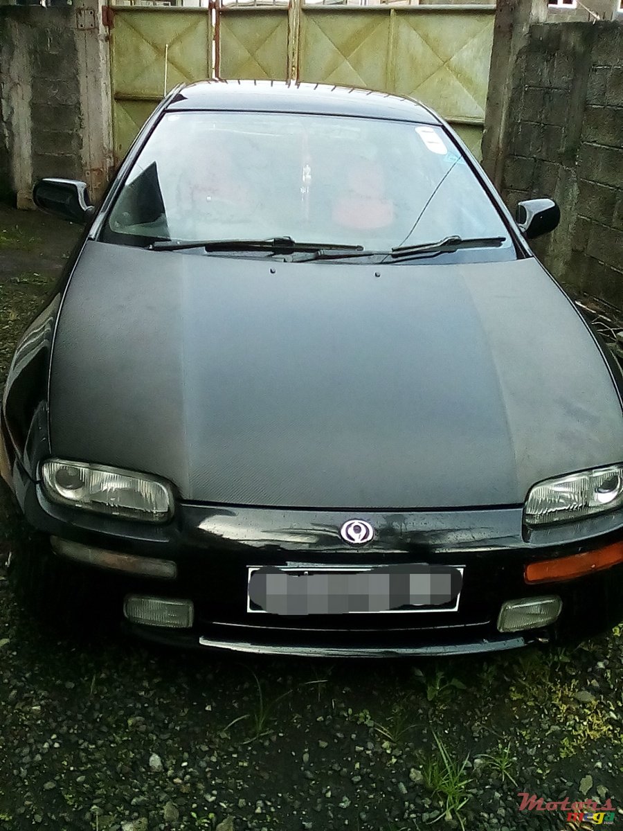 1997' Mazda 323 photo #1