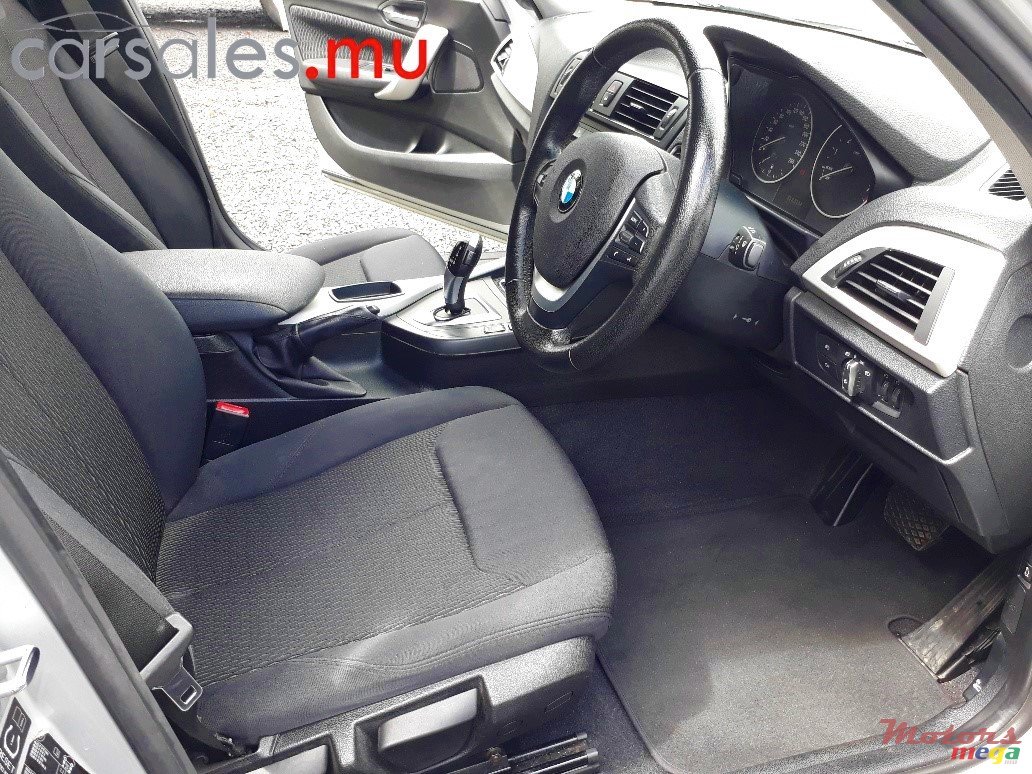 2011' BMW 116 photo #5