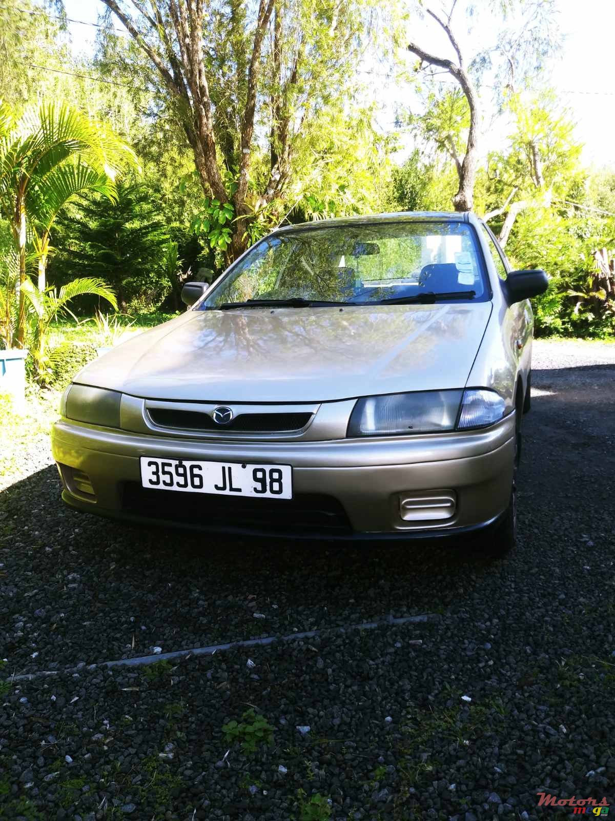 1998' Mazda 323 photo #1