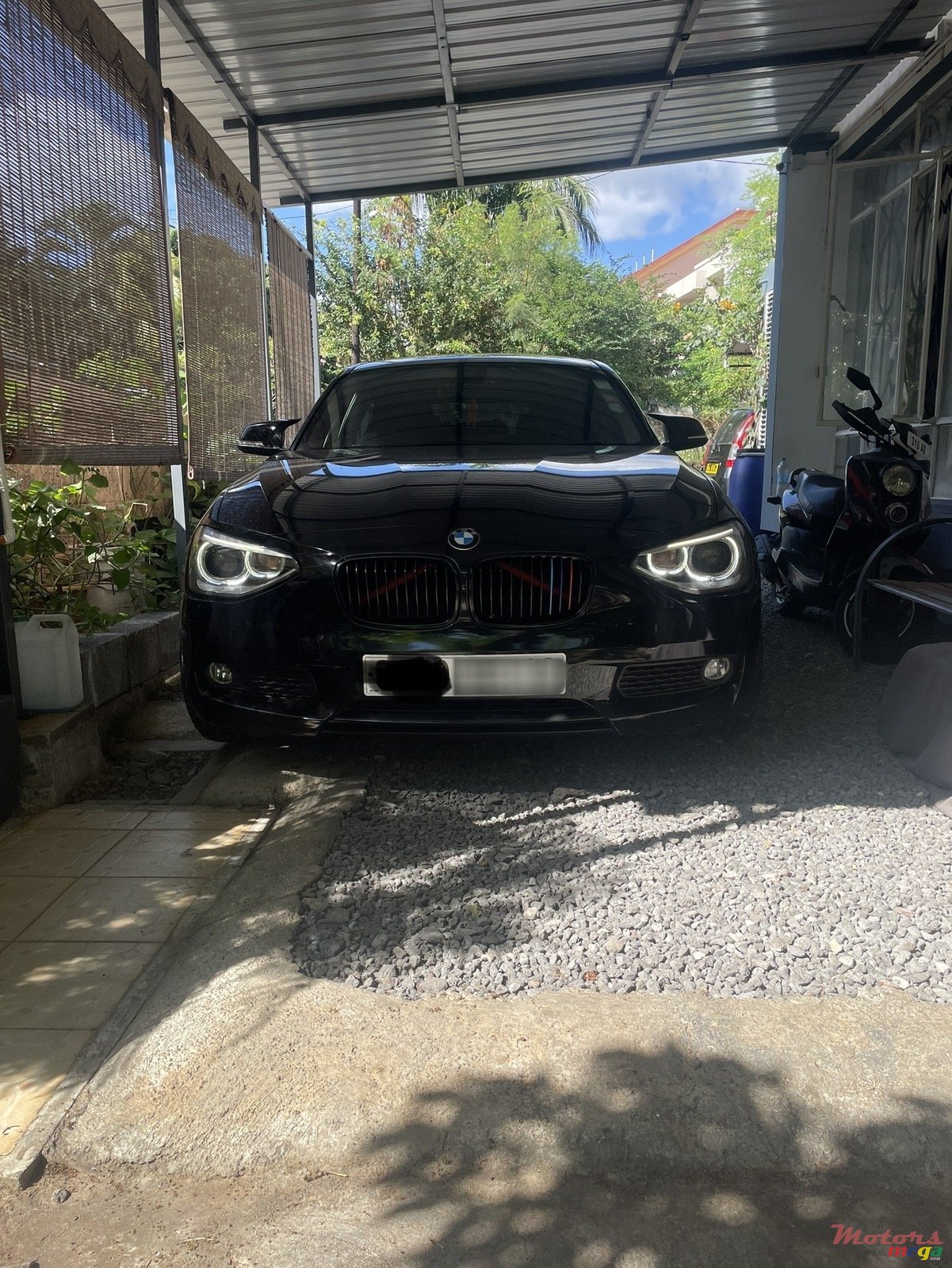 2012' BMW 1 Series 116i photo #2