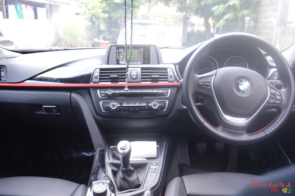 2013' BMW 320 photo #7