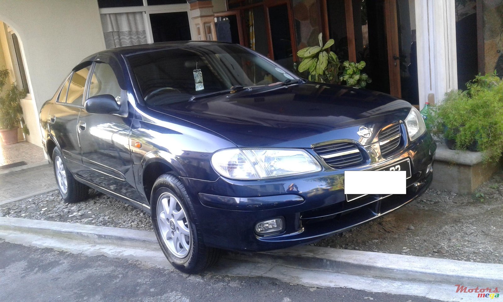 2002' Nissan Sunny photo #1