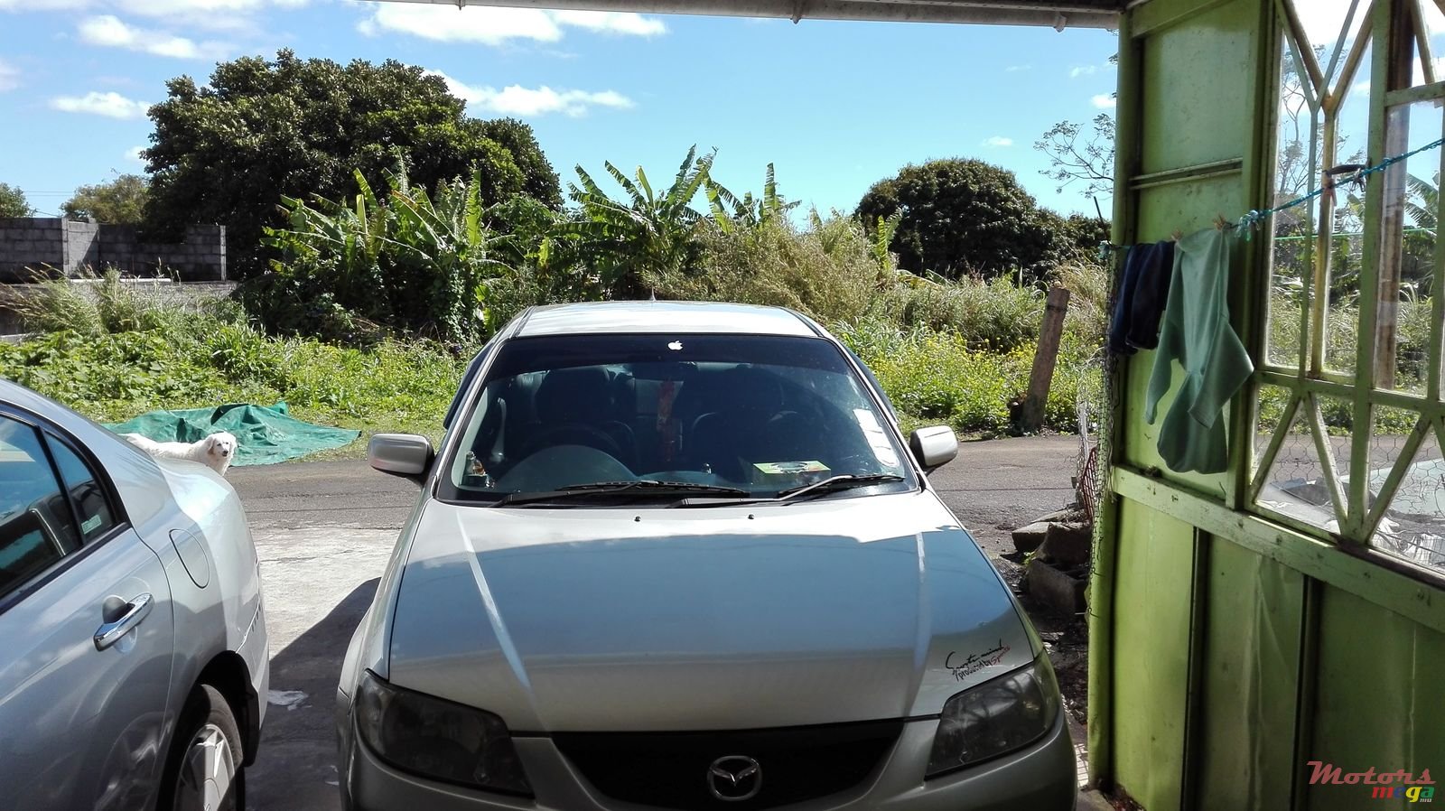 2003' Mazda 323 photo #1