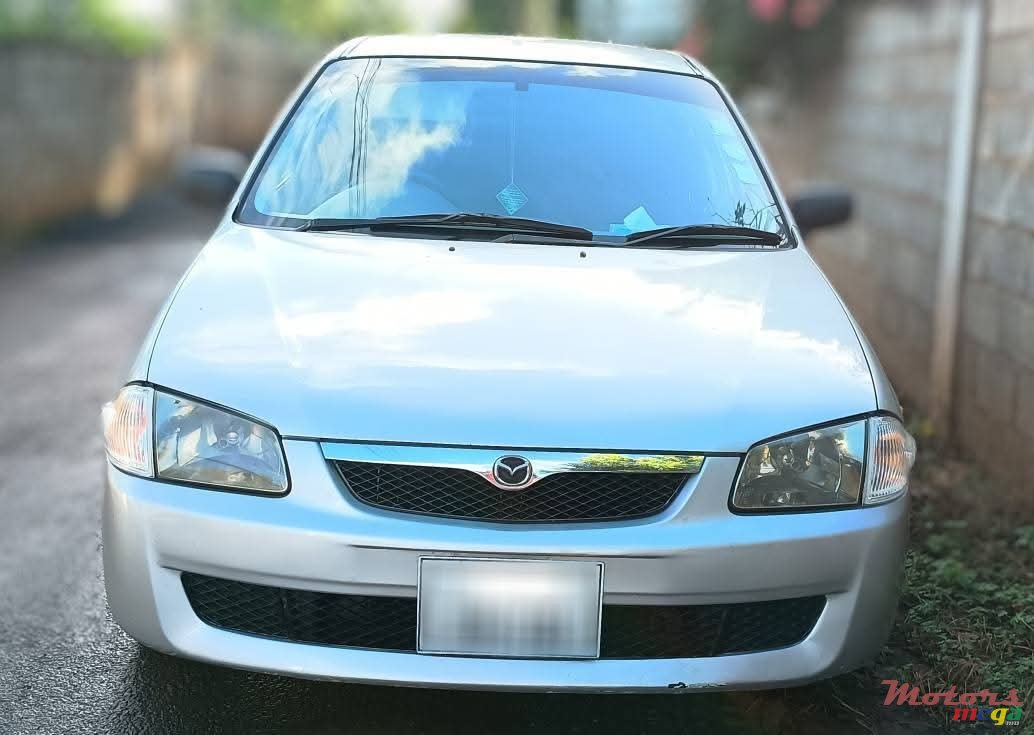 2000' Mazda 323 photo #7