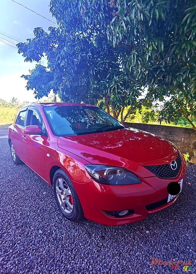 2004' Mazda Axela photo #1