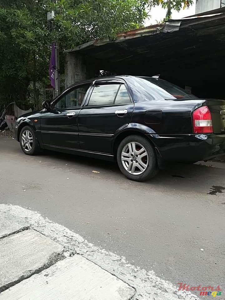 1999' Mazda 323 photo #5