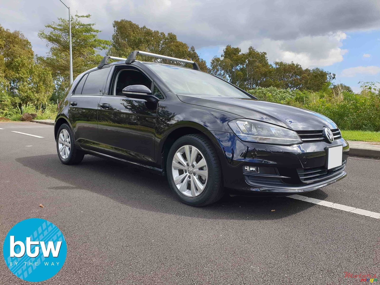 2014' Volkswagen Golf 7 Tsi Bluemotion photo #1