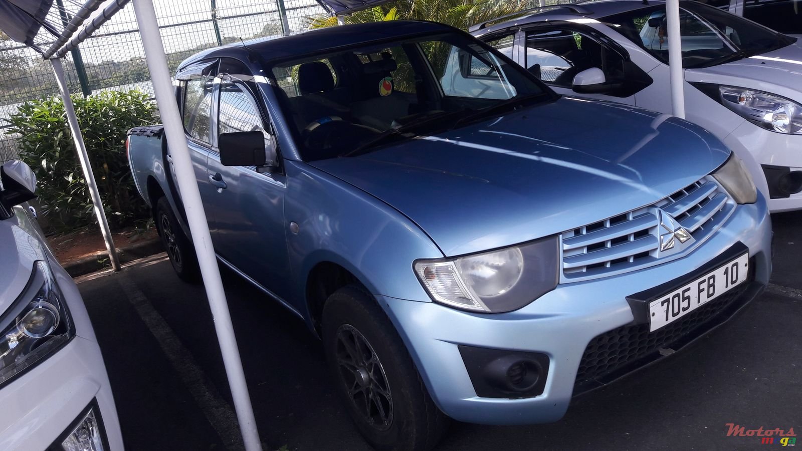 2010' Mitsubishi L 200 2 x 4 photo #1