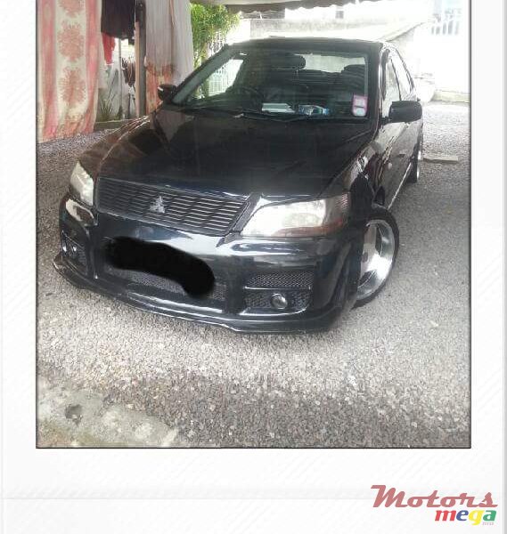 2002' Mitsubishi Lancer photo #1