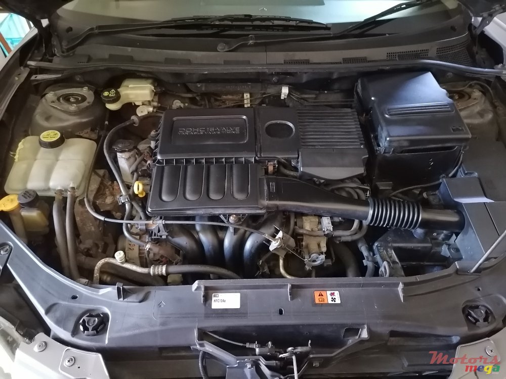 2004' Mazda 3 photo #2