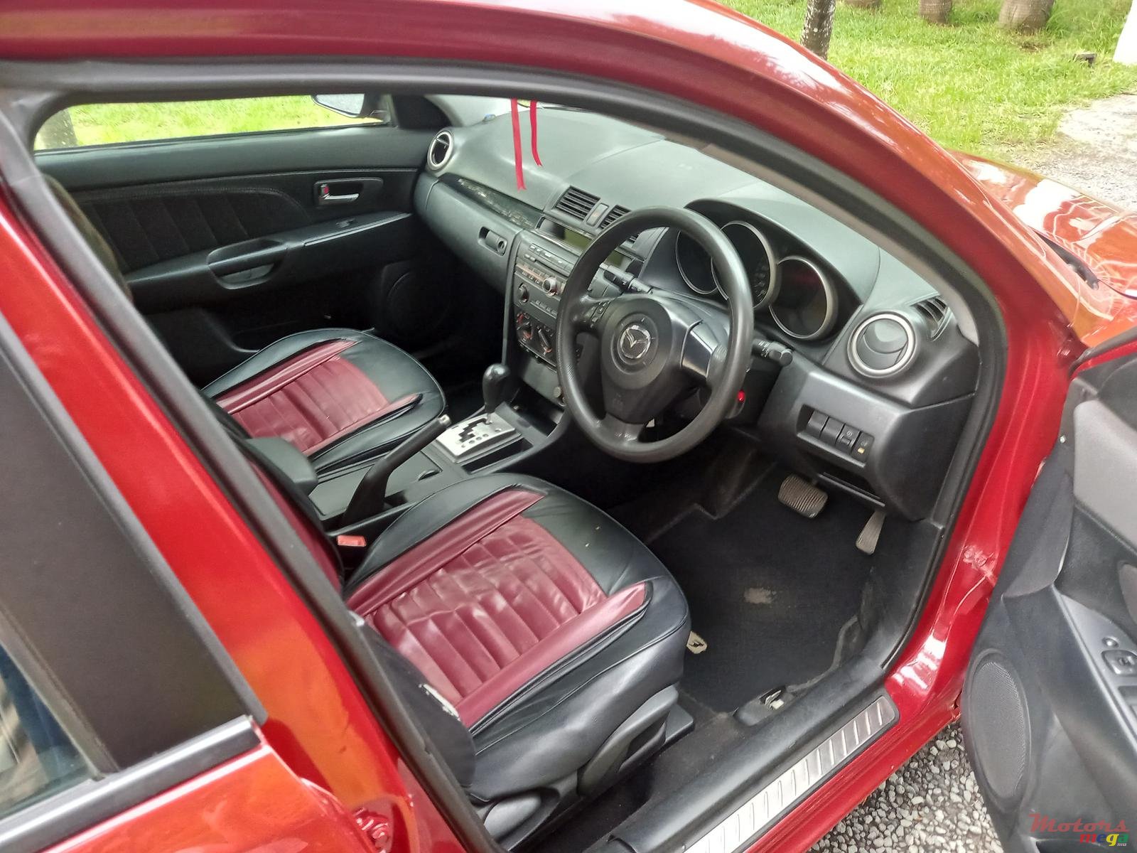 2004' Mazda 3 photo #1