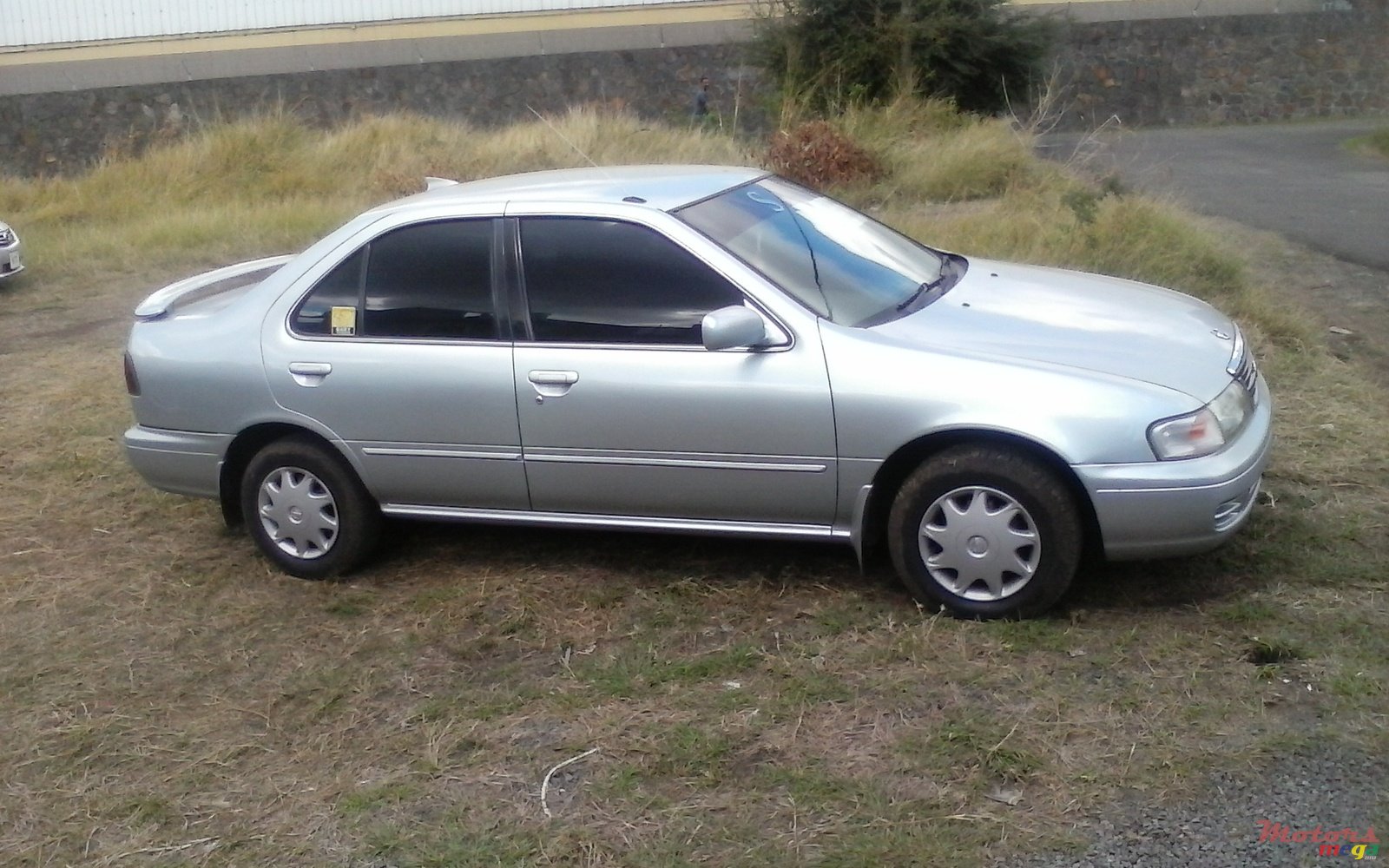 1998' Nissan Sunny photo #1