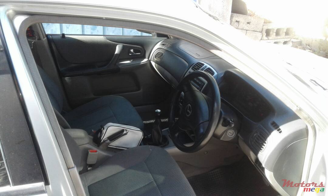 2003' Mazda Familia photo #1