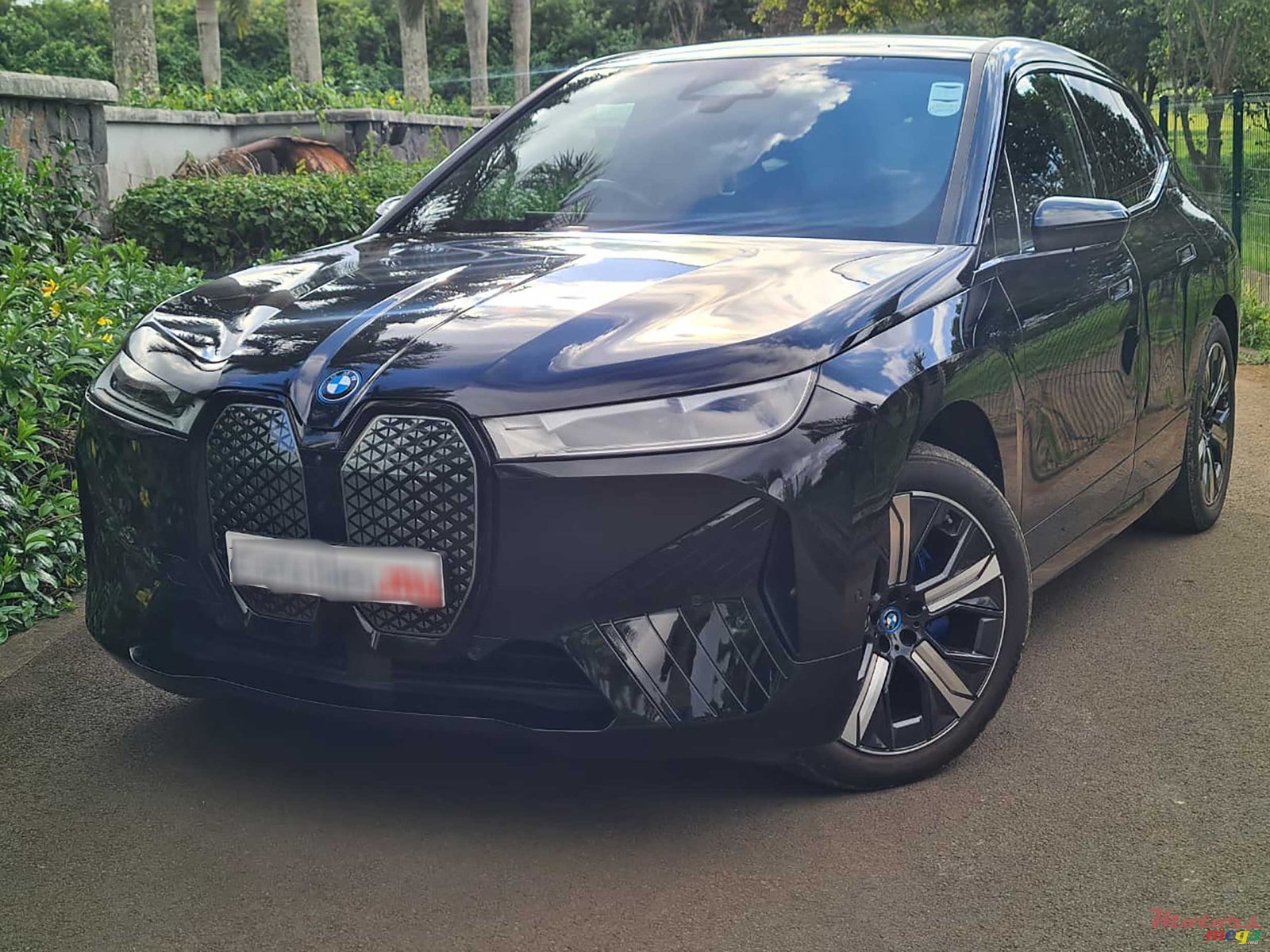 2024' BMW iX XDrive 40 photo #1