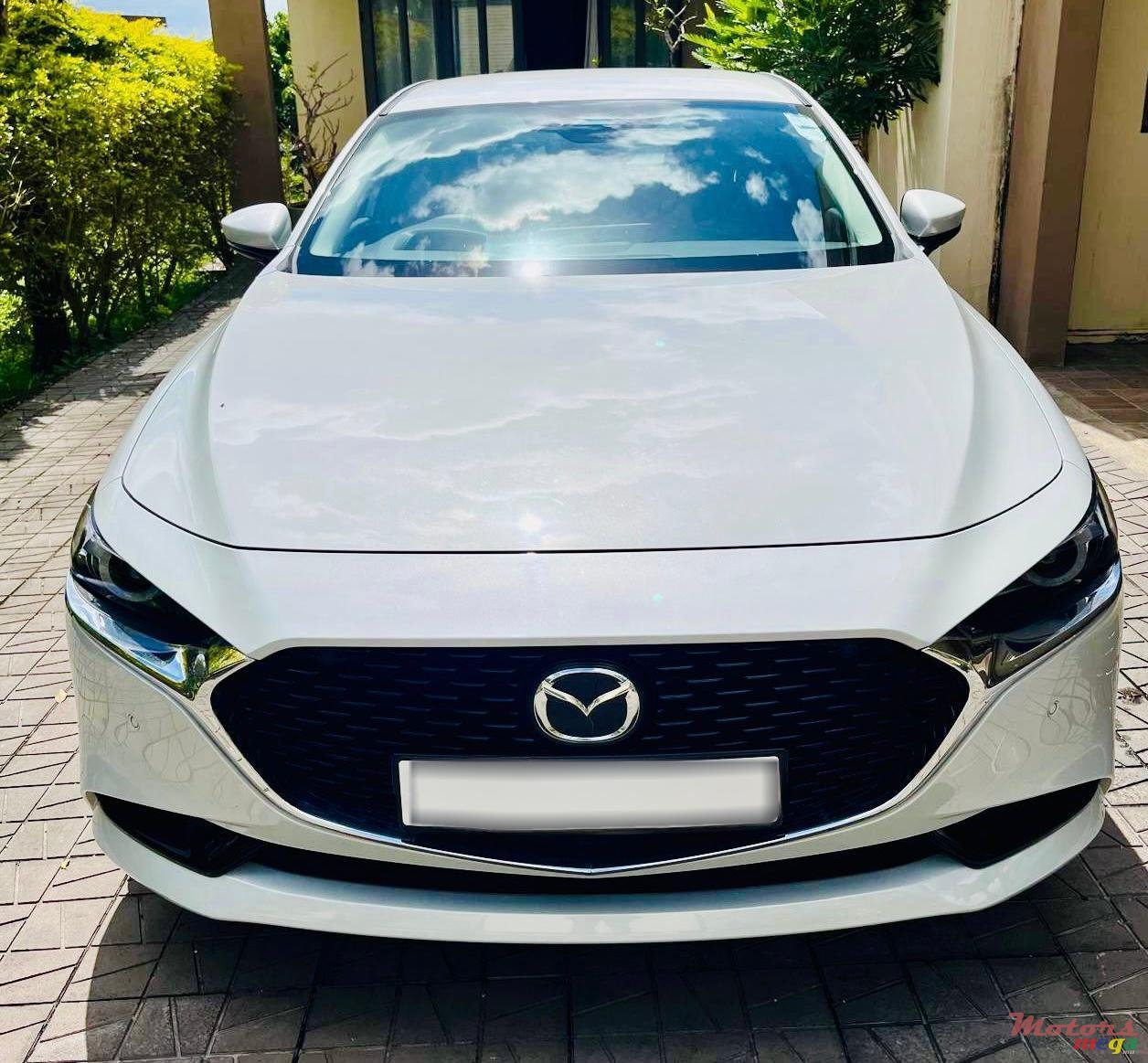 2024' Mazda 3 photo #1