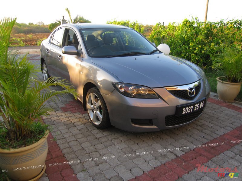 2004' Mazda Alloy wheels photo #1