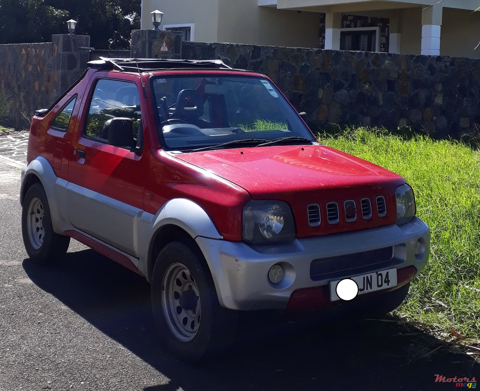 2004' Suzuki Jimny photo #1