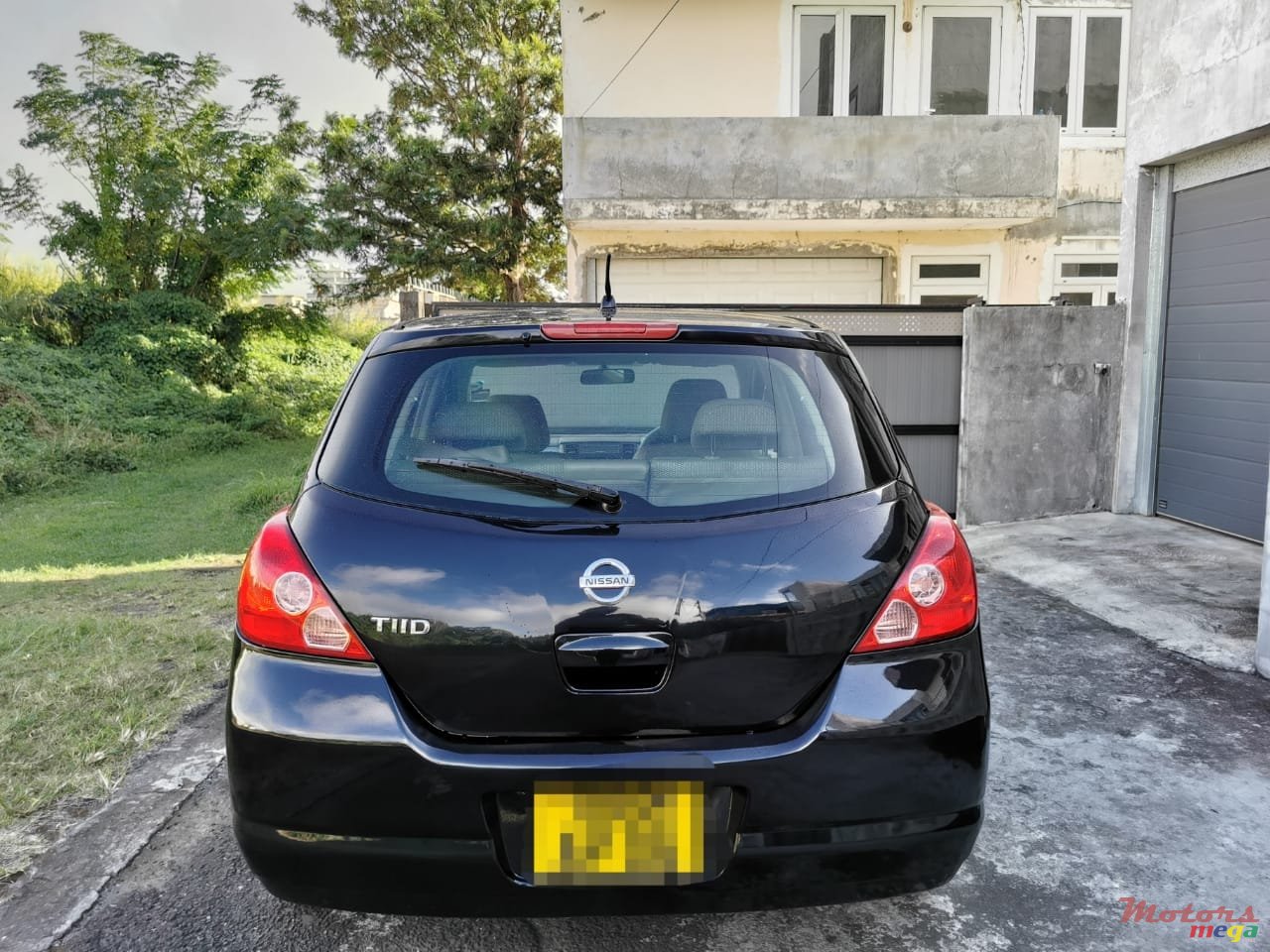2006' Nissan Tiida Hatchback photo #3