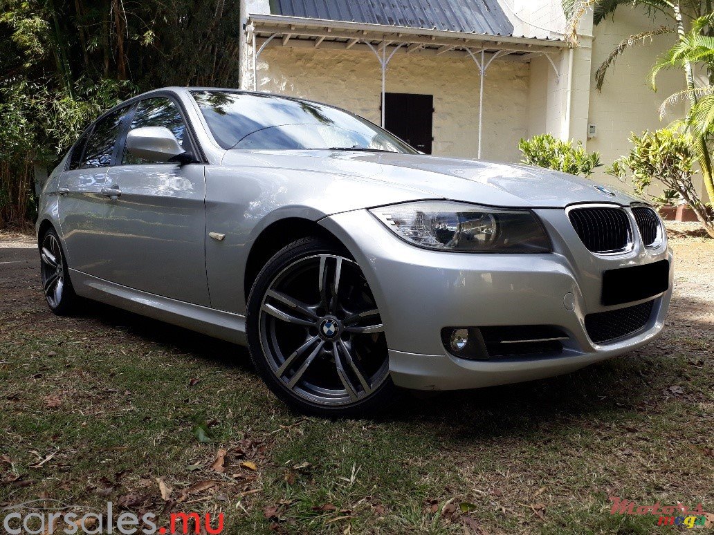 2009' BMW 318 photo #1