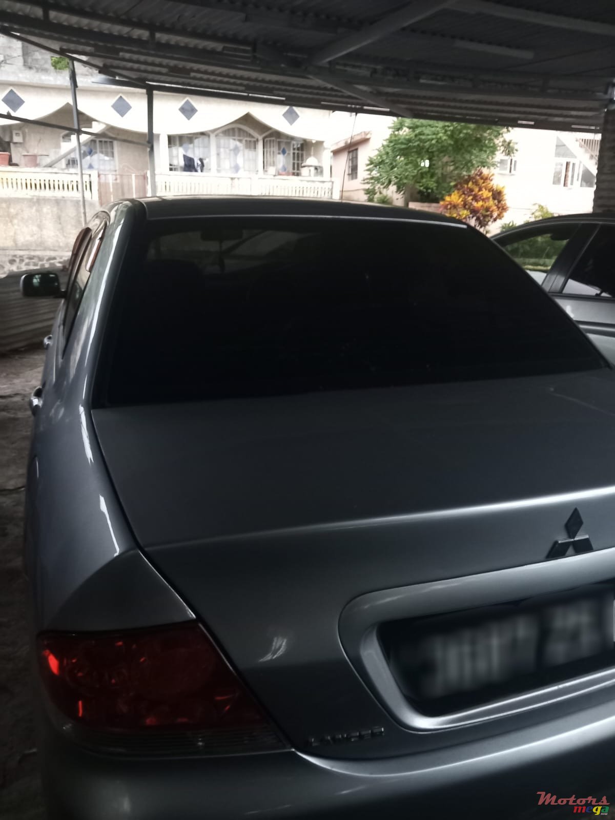 2004' Mitsubishi Lancer photo #6