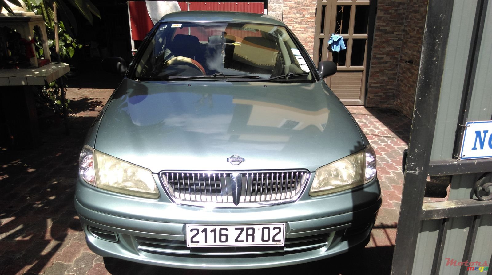 2002' Nissan Sunny photo #1