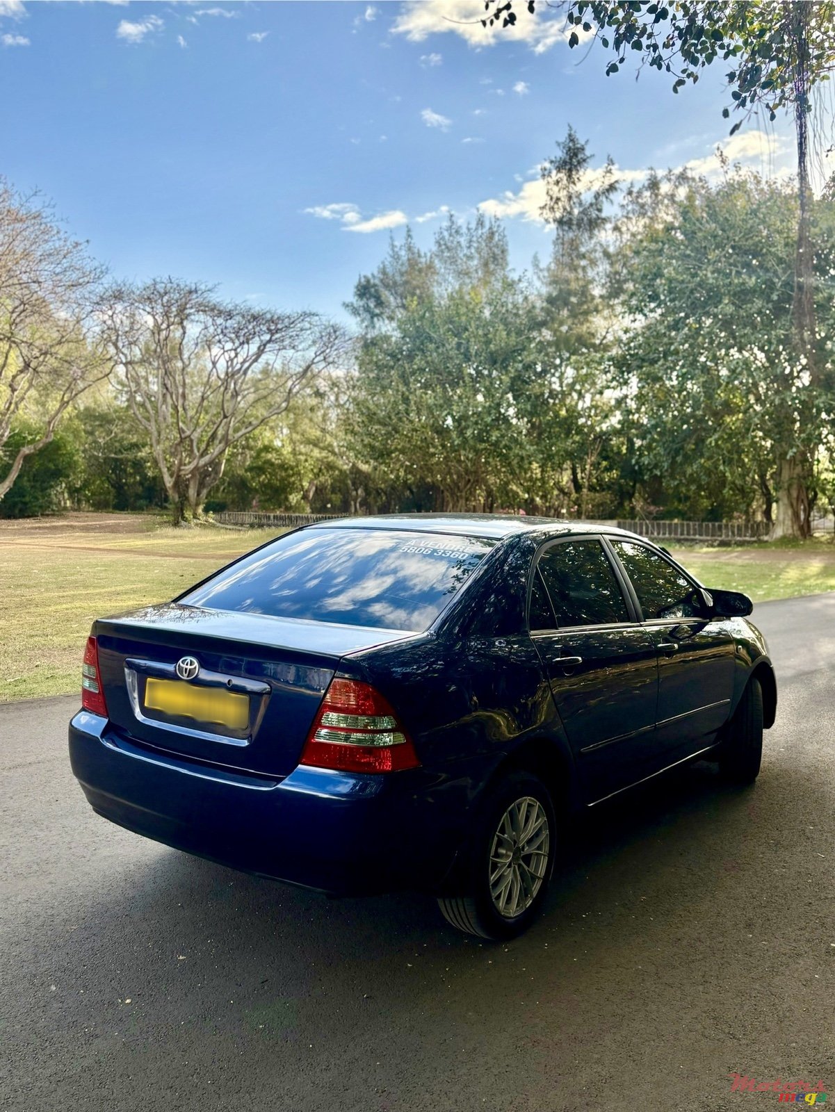 2004' Toyota Corolla NZE photo #4