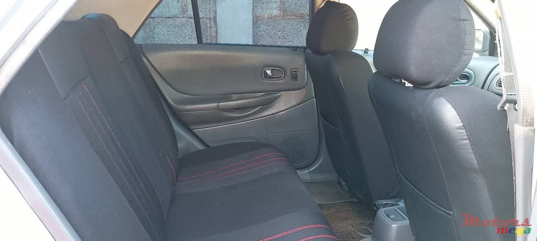 2000' Mazda 323 photo #6