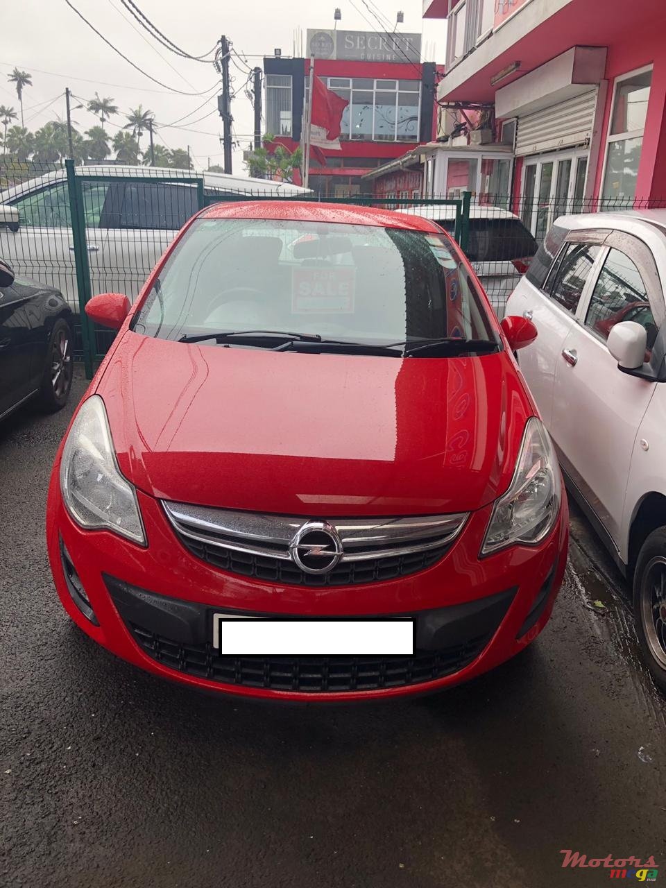 2011' Opel Corsa photo #1