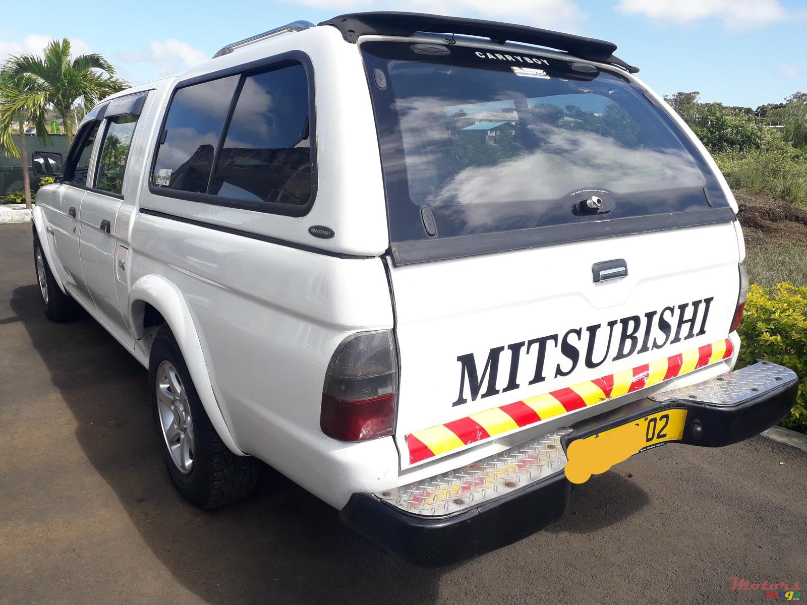 2002' Mitsubishi L200 photo #1