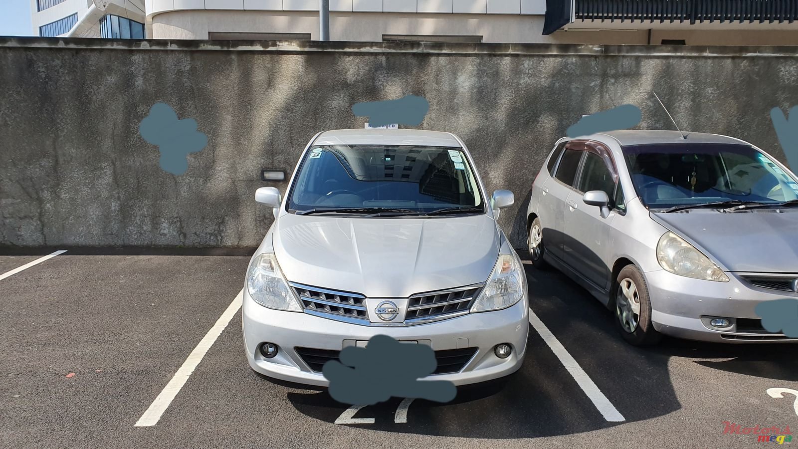 2012' Nissan Tiida photo #2