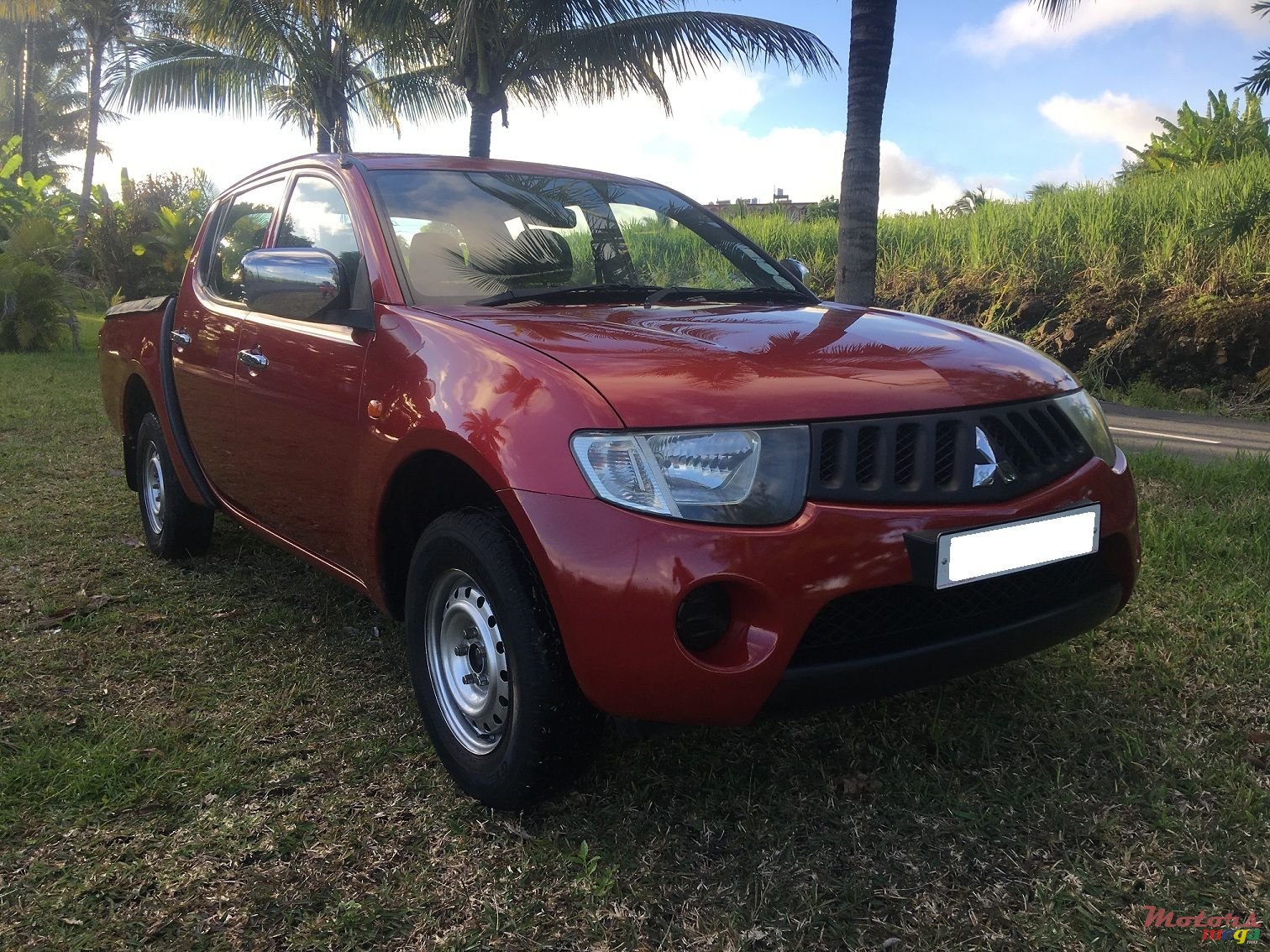 2009' Mitsubishi L200 Sportero photo #1
