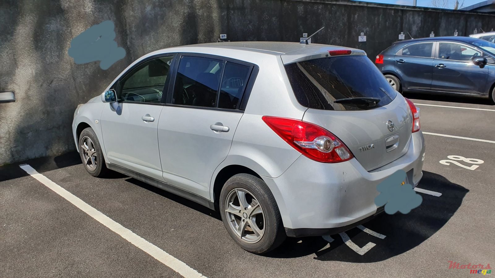 2012' Nissan Tiida photo #4