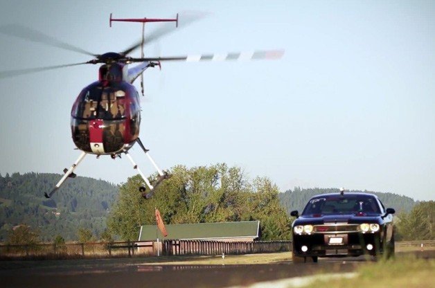 Place Your Bets: Dodge Challenger SRT8 Takes On... An MD500 Helicopter?