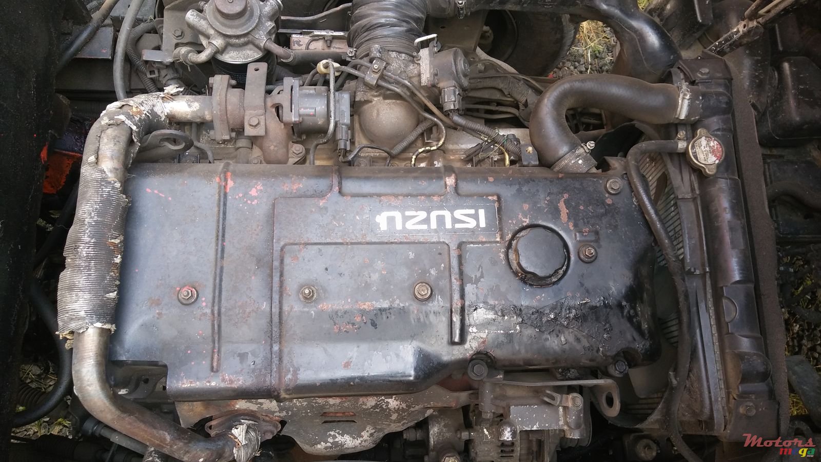 2002' Isuzu ELF truck photo #4