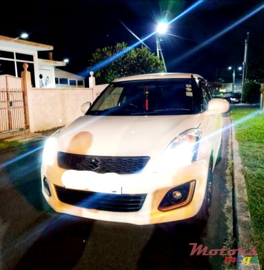 2015' Suzuki Swift photo #7