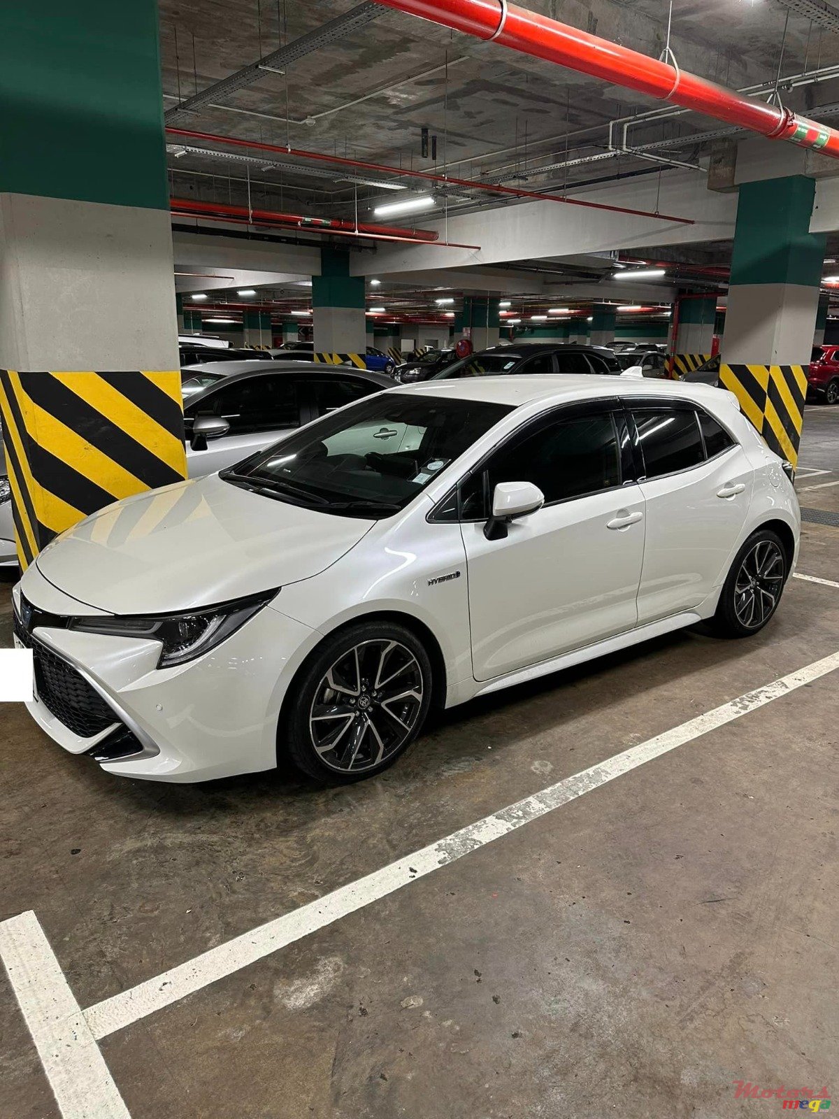 2020' Toyota Corolla Sport photo #2