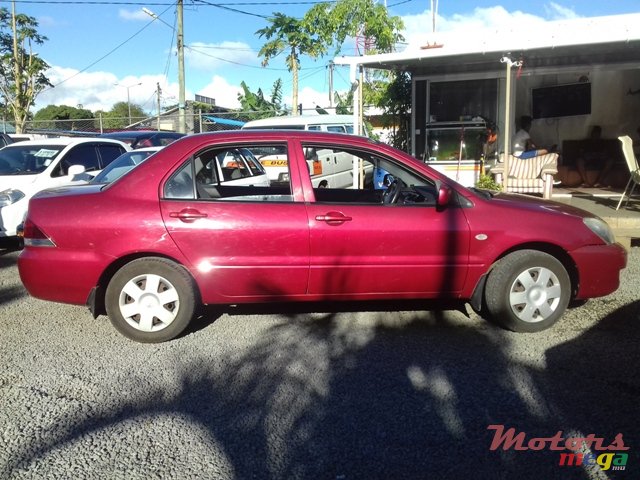 2009' Mitsubishi Lancer photo #3