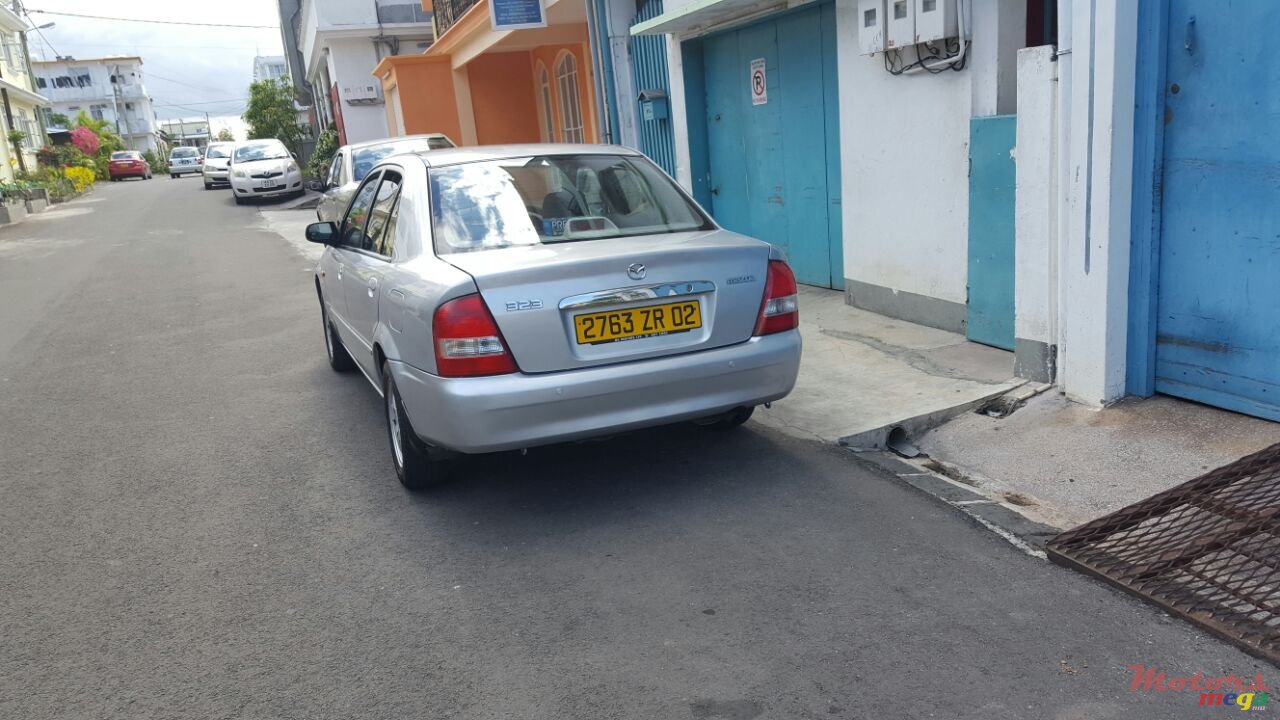 2002' Mazda Familia jant cosmic photo #5