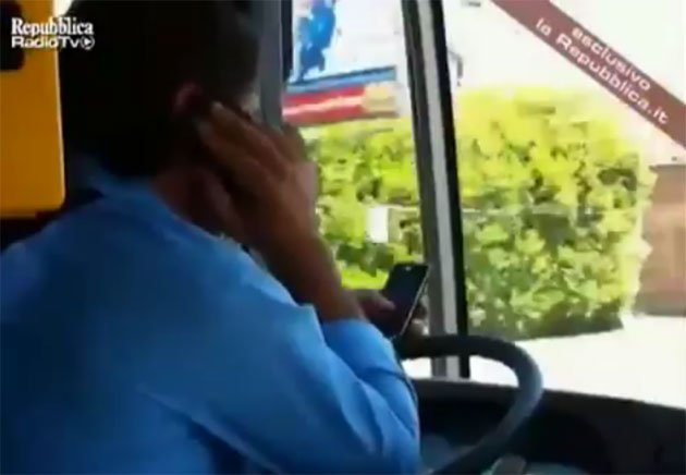 Italian bus driver fired for driving with elbows while using two phones