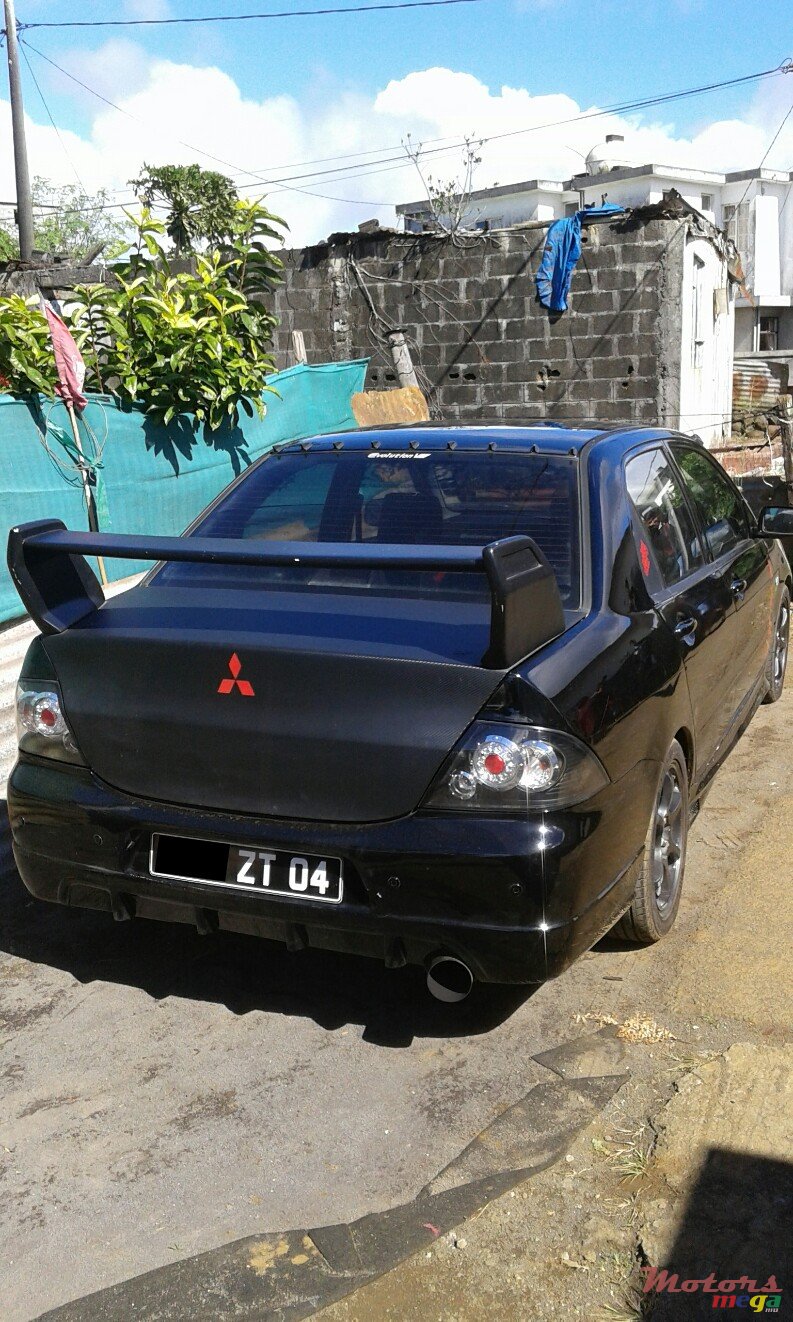 2004' Mitsubishi Lancer 4G18 photo #2