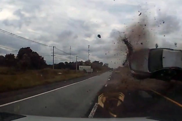 Quick-Witted Driver Avoids Airborne Barrel-Rolling Pickup