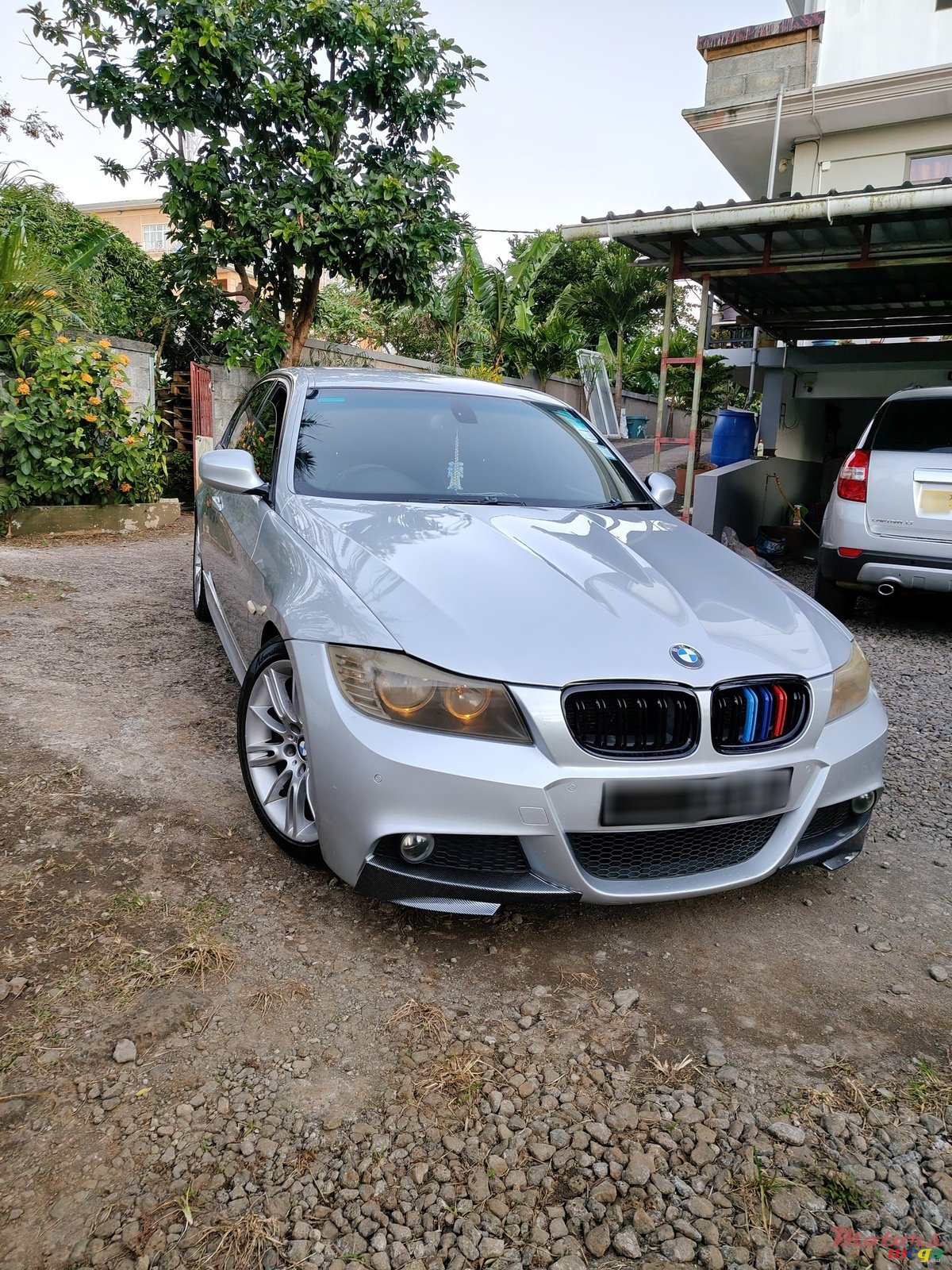 2009' BMW 318 photo #1