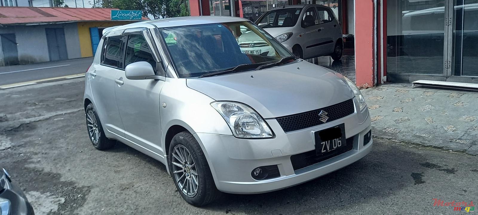 2006' Suzuki Swift photo #1