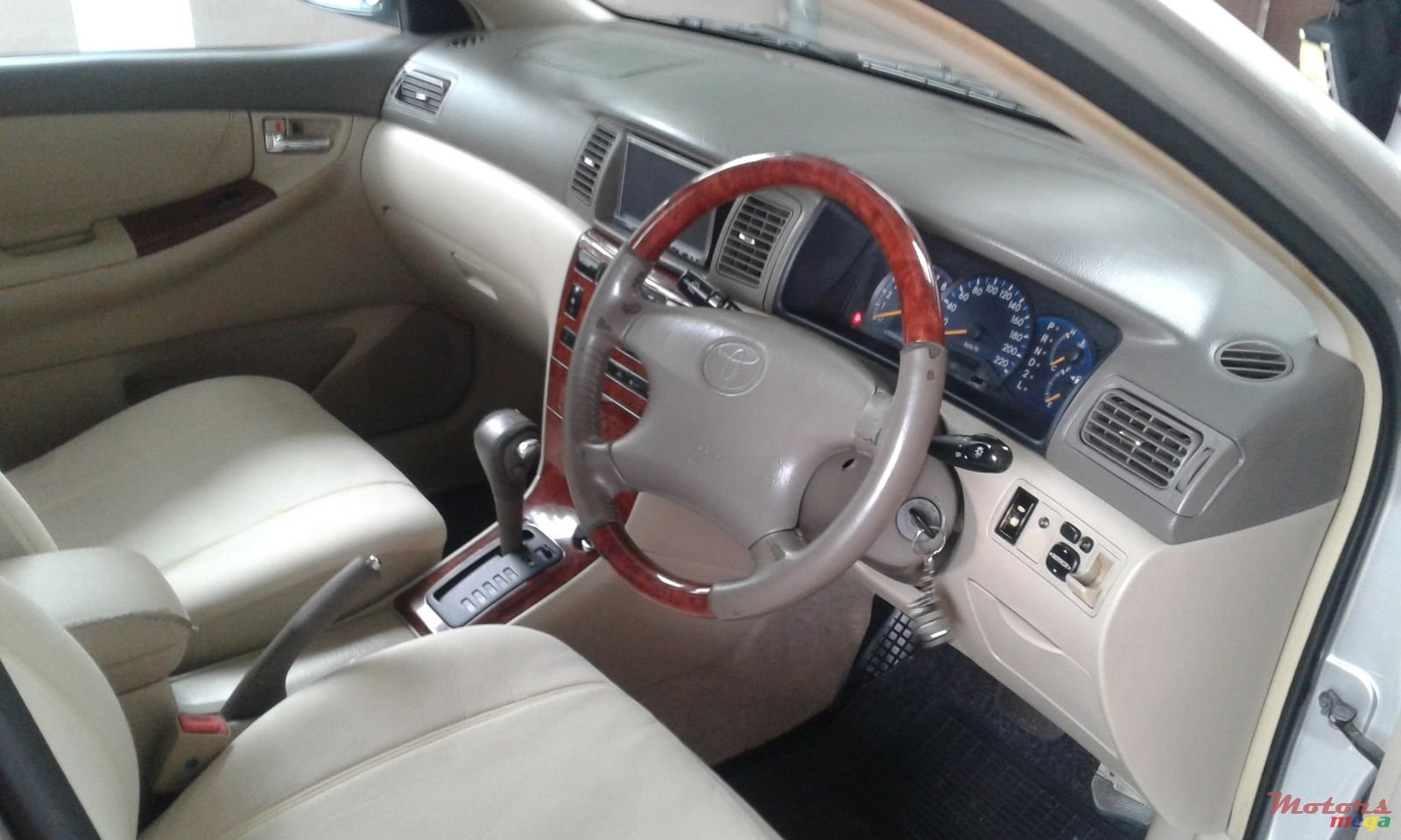 2002' Toyota Corolla NZE Automatic photo #4