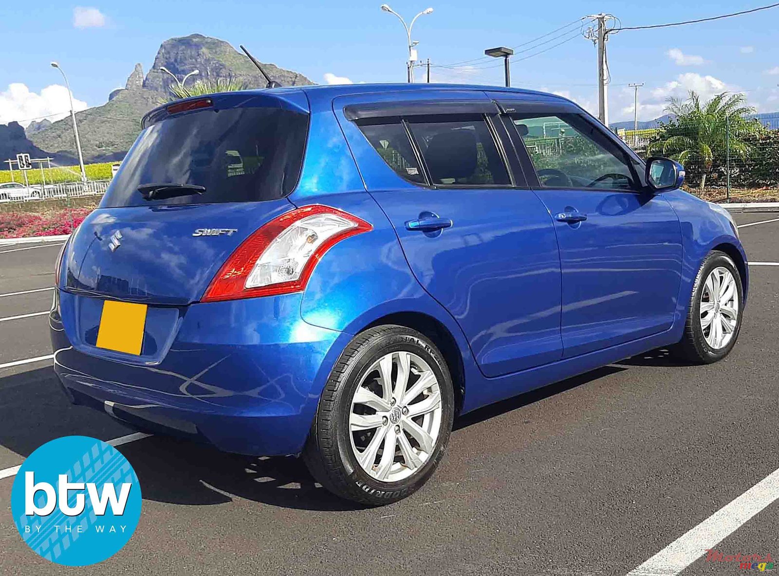 2014' Suzuki Swift photo #1