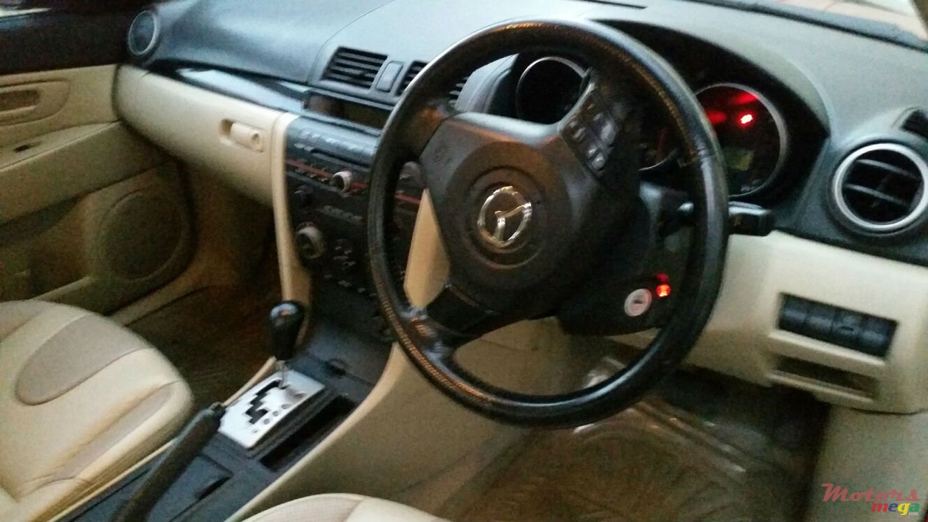 2005' Mazda 3 photo #1